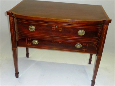 Lot 1548 - A Mahogany, Satinwood Banded and Ebony Strung Bowfront Sideboard, the single frieze drawer...