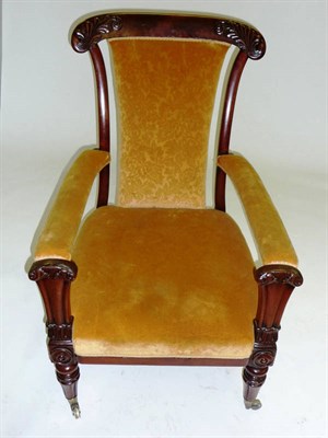 Lot 1551 - An Early Victorian Mahogany Library Armchair, mid 19th century, upholstered in floral yellow...