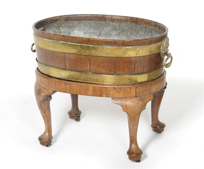 Lot 1554 - A George III Mahogany and Brass Bound Wine Cooler, third quarter 18th century, of staved...