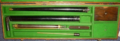 Lot 403 - A 19th Century Walking Stick Air Gun, painted black, in two screwed together sections, with...