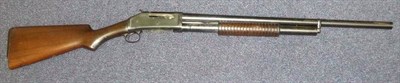 Lot 427 - A Deactivated Model 1897 Winchester 12 Bore Pump Action Shotgun, numbered E732421, with walnut semi