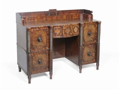 Lot 1560 - A Scottish Regency Mahogany Sideboard, second quarter 19th century, the staged back with...