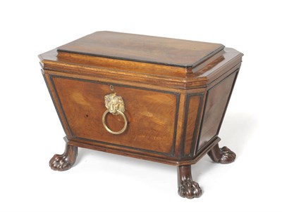 Lot 1562 - A Regency Mahogany Wine Cooler, early 19th century, of sarcophagus form, the moulded hinged lid...