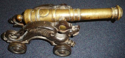 Lot 463 - A Model of a Signal Cannon, the 38cm brass barrel with ring knopped decoration, globular...