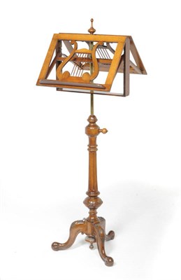 Lot 1564 - A Victorian Walnut Duet Stand, late 19th century, the rectangular upper section with two lyre...