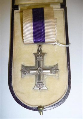 Lot 12 - A First World War Military Cross, in gilt tooled maroon leather case