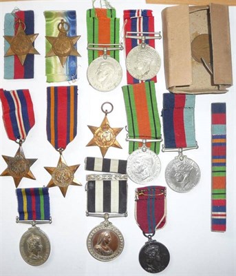 Lot 34 - A Boxed Group of Four Second World War Medals, comprising Atlantic Star, Africa Star, Defence...