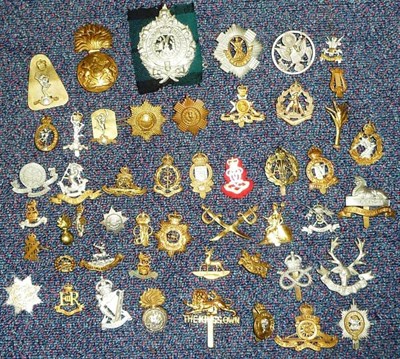 Lot 59 - A Collection of Approximately One Hundred Military Cap and Collar Badges and Shoulder Titles,...
