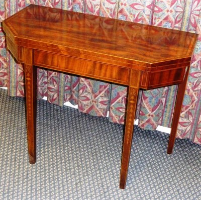 Lot 1572 - A George III Mahogany, Satinwood and Ebony Strung Canted Tea Table, late 18th century, the...