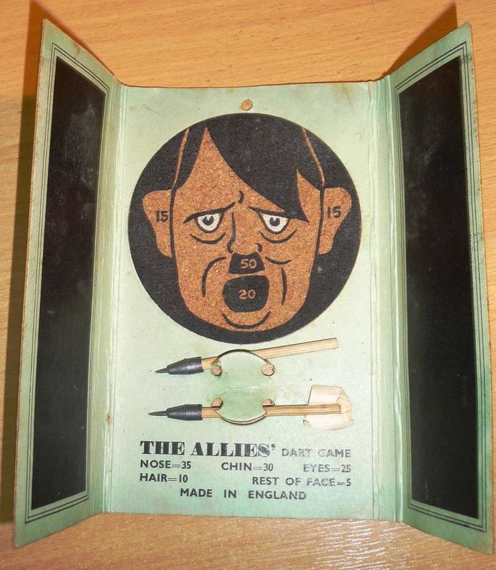 Lot 109 - A Second World War ";The Allies' Dart Game";, with a circular cork dartboard printed as the head of