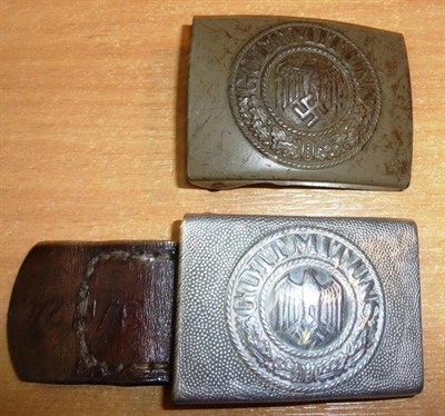 Lot 158 - A German Third Reich Army Other Ranks Steel Belt Buckle, decorated in khaki paint; a German...