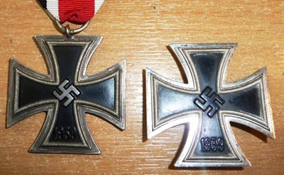 Lot 159 - A German Third Reich Iron Cross, First Class, the sword shape pin stamped with maker's mark...