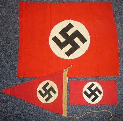 Lot 161 - A German Third Reich NSDAP Small Flag, with circular white cotton panel printed with a swastika...