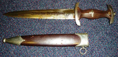 Lot 171 - A German Third Reich SA Dagger, the steel blade etched Alles fur Deutschland, with RZM mark...