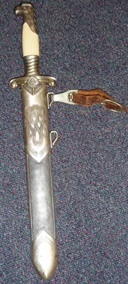 Lot 172 - A German Third Reich RAD Officer's Dagger, the hatchet tip fullered steel blade etched Arbeit...