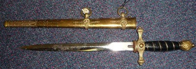 Lot 176 - An Imperial German Naval Dirk, with 23cm plain plated steel blade, brass hilt with fluted leaf...