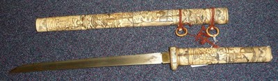 Lot 182 - A Late 19th Century Japanese Wakizashi, with 32.5cm single edge steel blade, the sectional bone...