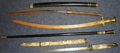 Lot 184 - A Japanese Wakizashi, with 39cm machine forged blade, the sectional bone hilt and scabbard...