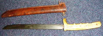 Lot 191 - A Japanese Wakizashi, with 31cm steel blade set into a later bone grip, one side with carved finger