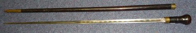 Lot 203 - A Georgian Sword Cane, the 78cm single edge fullered steel blade half blued and gilt with...