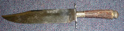 Lot 236 - A Victorian Bowie Knife, the 24cm hatchet tip steel blade stamped JOHN NOWILL & SONS LTD,...