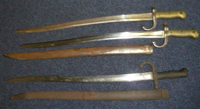 Lot 241 - Three French Model 1866 ";Chassepot"; Yataghan Sword Bayonets, one with blade dated 1874 and...