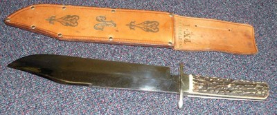 Lot 264 - A George Wolstenholm & Son, Sheffield I*XL Bowie Knife, the 25cm hatchet tip steel blade...