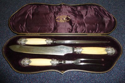 Lot 266 - A Late Victorian Three Piece Carving Set by Joseph Rodgers & Sons, Sheffield, comprising knife,...