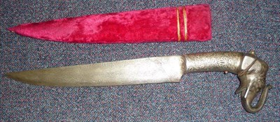 Lot 274 - An Indian Knife, with single edge damascus blade, the grip inlaid with silver foliate tendrils,...