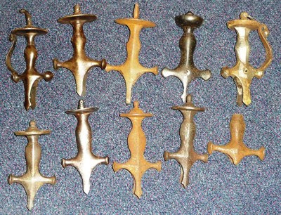 Lot 280 - A Collection of Ten Indian Talwar Hilts, two with curved knuckle bows (10)