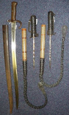 Lot 284 - Two North African Camel Sword-Whips, each with a square tapering stiletto type blade with a twisted