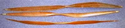 Lot 290 - Three Andaman Island Wood Bows, each of sinuous double paddle form, one plain with sharp...