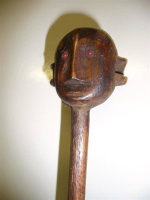 Lot 315 - A Nyamwezi, Tanzania Carved Wood Figural Dignitary Staff,  the small flattened globular head...