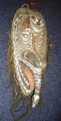 Lot 326 - A Sepik River, Papua New Guinea Display Mask,  with domed forehead, inlaid cowrie shell eyes,...