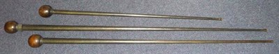 Lot 333 - Three Zulu Ebonised Staffs, each with small globular head on a tapering cylindrical haft,...