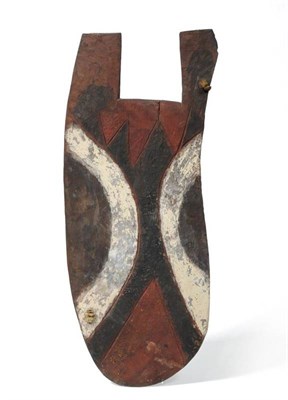 Lot 338 - A Mendi, Southern Highlands, Papua New Guinea Archer's Wood Shield, of rounded oblong form, the top