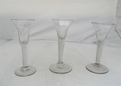 Lot 2 - Two Wine Glasses, circa 1750, each with drawn trumpet bowls on multiple spiral air twist stems,...