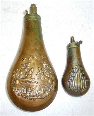 Lot 353 - A 19th Copper Powder Flask, embossed with spaniels leaping up at game birds in flight, the...