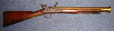 Lot 450 - An Early 19th Century Flintlock Blunderbuss, the 44.5cm brass barrel with ringed muzzle, London...