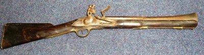 Lot 451 - An Early 19th Century Flintlock Blunderbuss, the 40.5cm flared steel two stage barrel octagonal...