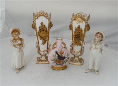 Lot 12 - A Pair of Worcester "Kate Greenaway" Figural Pepperettes, 1882, circa 1882, decorated in scant...