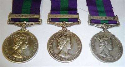 Lot 40 - Three General Service Medals 1918-62: one with clasp MALAYA (Elizabeth II) awarded to 22840610...