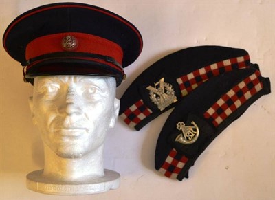 Lot 155 - A No.1 Dress Peaked Cap, to an officer of the Berkshire Regiment with red silk lining and...