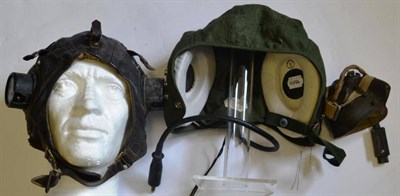 Lot 160 - A Second World War RAF Leather Flying Helmet, C Type, the bakelite earphones marked AM centred by a