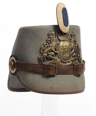 Lot 162 - A Bavarian Jaegar Regimental Shako, of pale green felted wool with rolled and stitched leather...