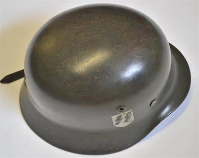 Lot 164 - A German M35 Helmet,  the field grey body with SS2 double decals, the inner rim stamped DN425, with