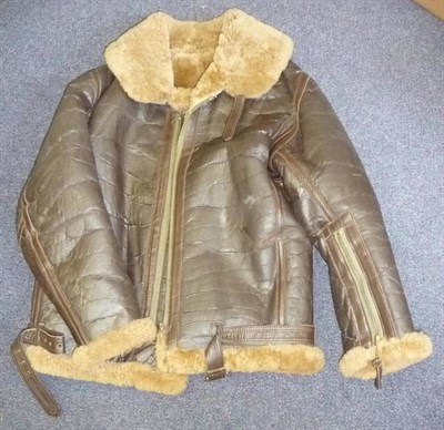 Lot 169 - An Irvin Sheepskin Flying Jacket, with label `Replica World War II Flying Jacket, made under...