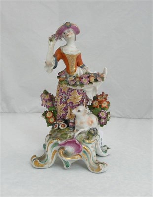 Lot 31 - An English Porcelain Encrusted Figure of a Shepherdess, probably Chelsea-Derby, circa 1770, she...