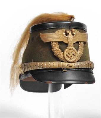 Lot 183 - A German Third Reich Metropolitan Police Shako for Senior Officers, with black leather crown, front