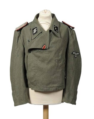 Lot 186 - A German Third Reich SS-Untersturmführer's (2nd Lieutenant) Field Grey/Green Wrap-over...